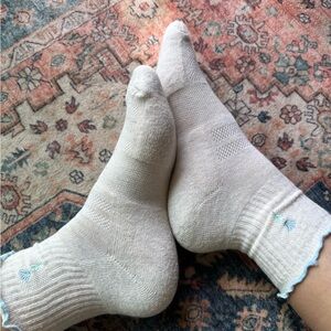 Worn Woman’s cream crew socks